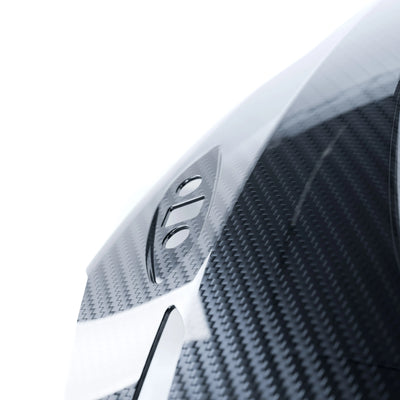 Close-up of 2x2 twill weave gloss carbon fiber finish on RBM front fairing for Aprilia RS660 2025+